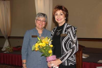 President Maxine Williams thanks outgoing Vice President/Membership Chair and Ladies Outings Chair, Maureen Callaway, for her service to the EPWC. 