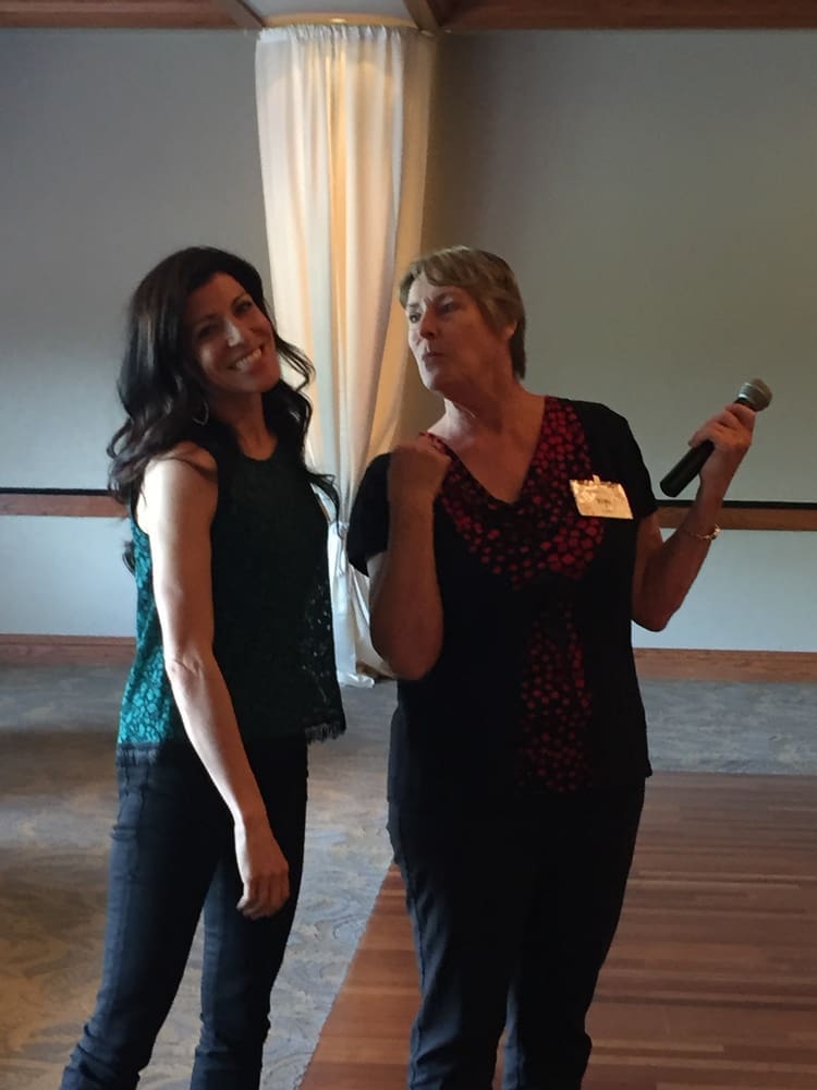 Program coordinator, Wyn Lewis and the boutique owner share a fun moment.