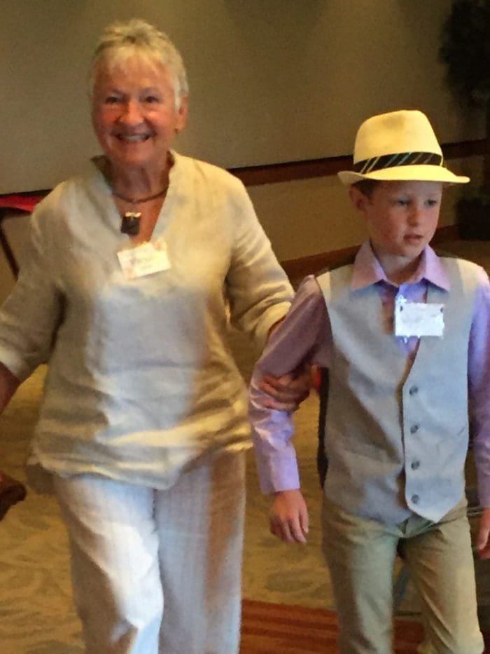 Renate, knitting group chair, escorted by Wyatt.