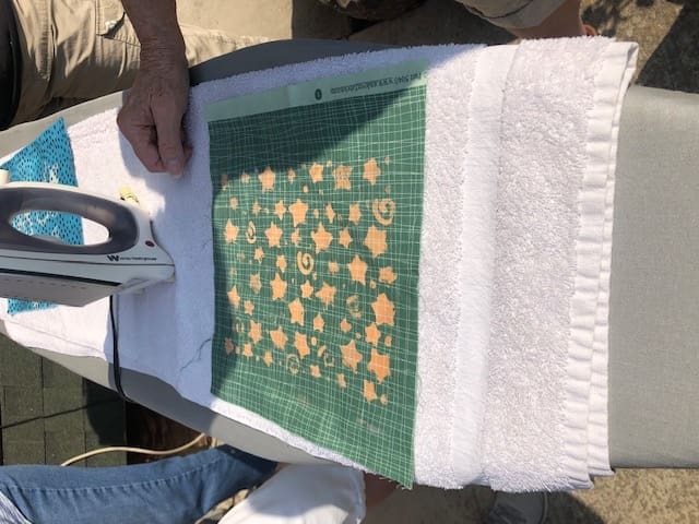The green fabric turned orange.